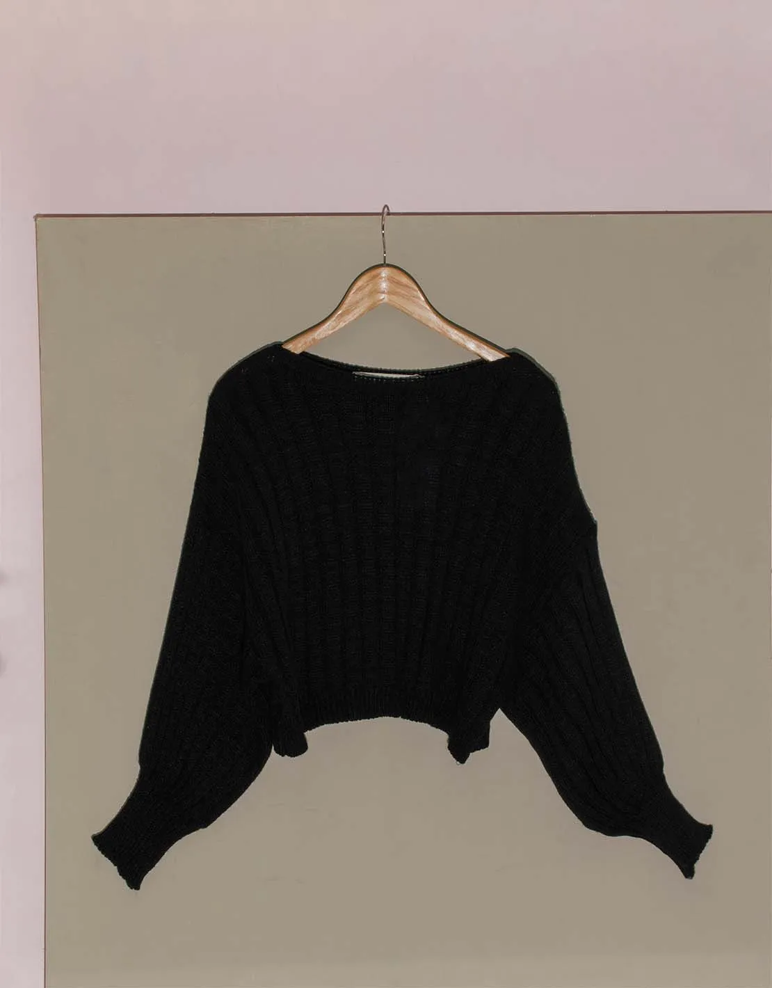 Cropped cable sweater