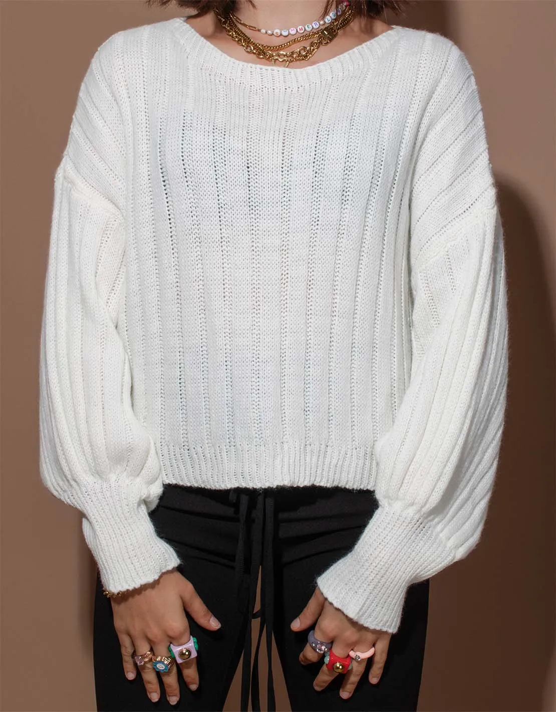 Cropped cable sweater