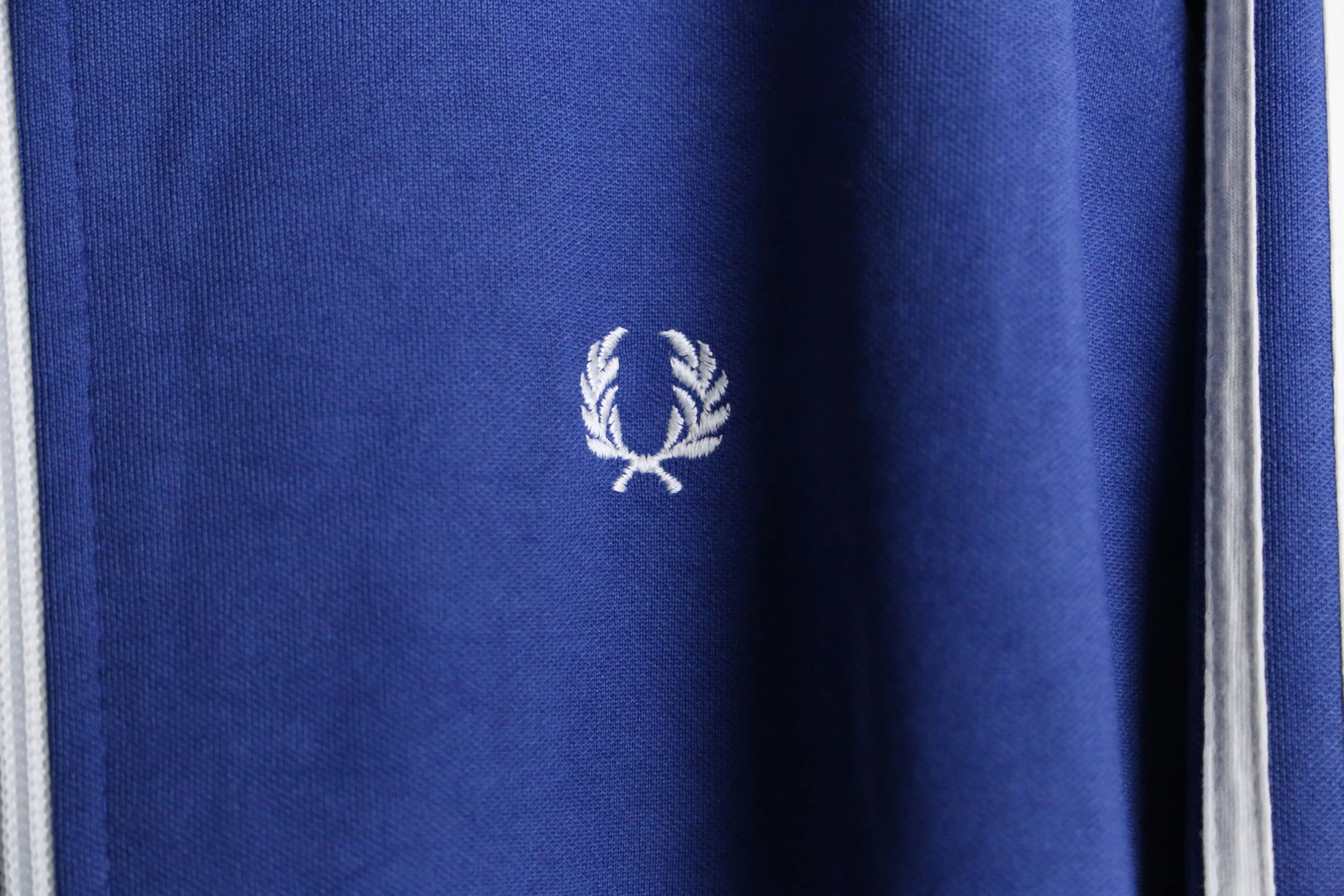 "FRED PERRY" blue × white zip up track jacket