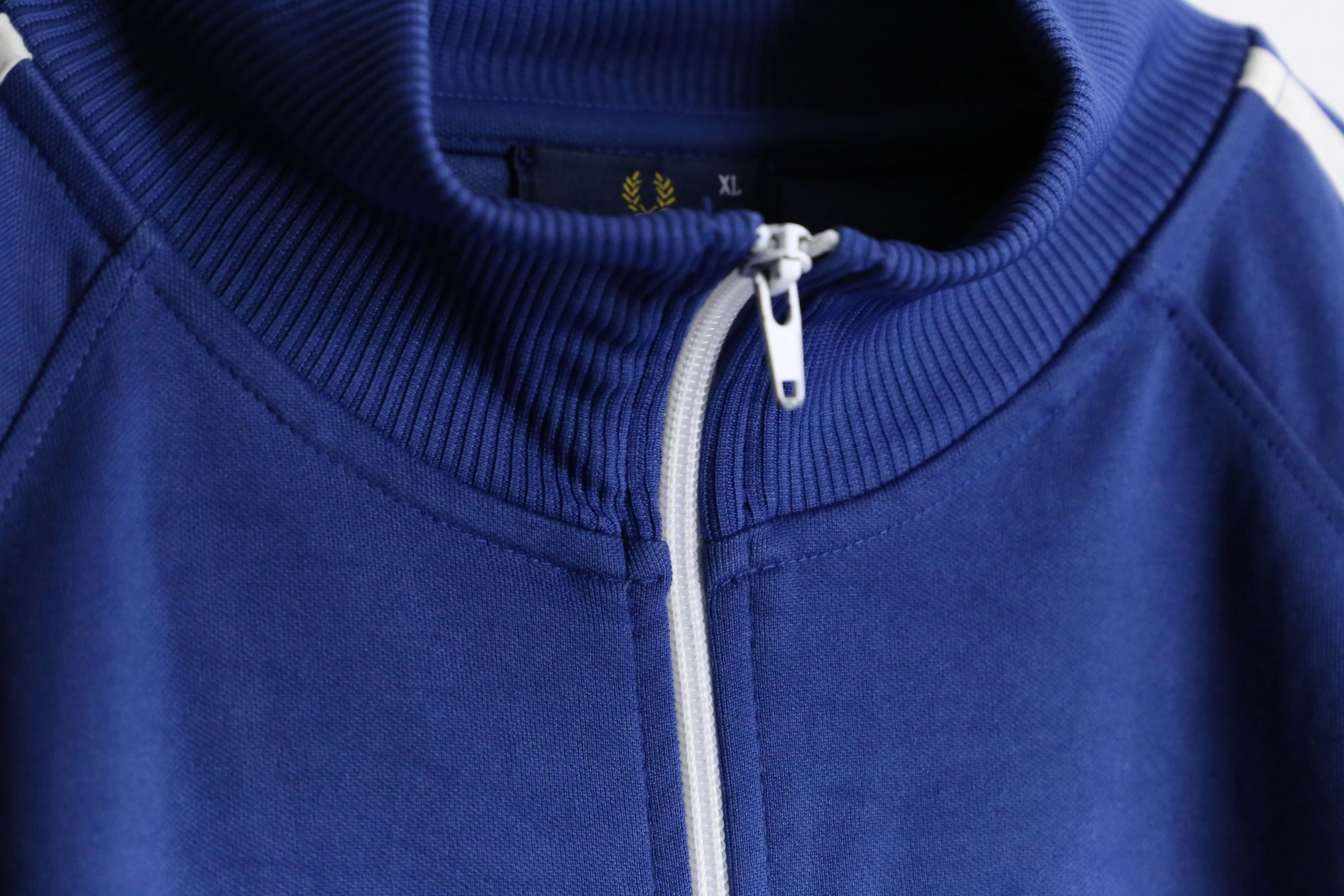 "FRED PERRY" blue × white zip up track jacket